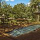 Piscinas termais aquecidas com pessoas relaxando no inverno, Jurema Águas Quentes
